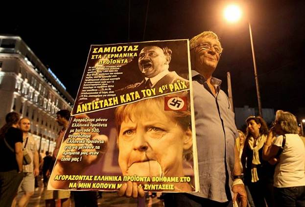 http://fotos.eluniversal.com.mx/web_img/fotogaleria/protesta_contra_merkel_grecia.jpg